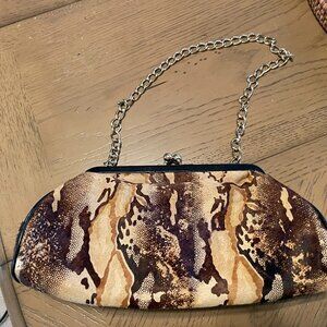 Cowhide and Leather Clutch Riki Rosetta
